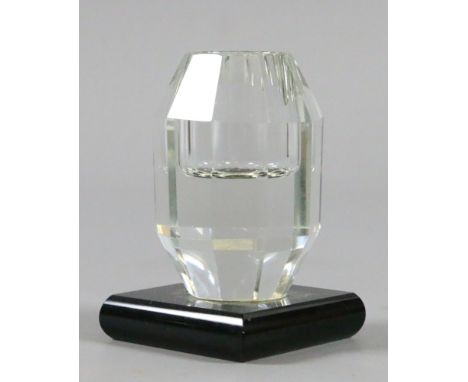 A Czechoslovakian faceted crystal inkwell on onyx plinth. Signed.