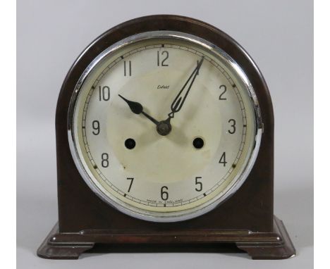 A Bakelite cased eight day mantel clock chiming half-hourly on a coiled gong.