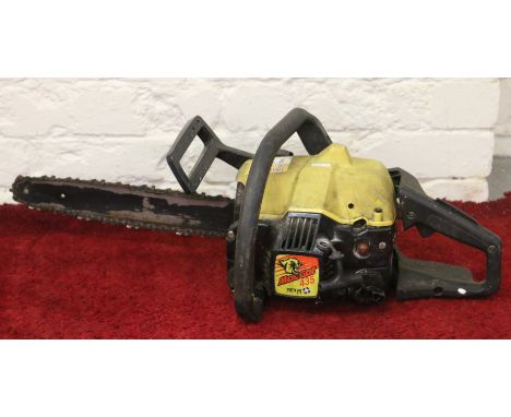 A Mac Cat petrol engine chain saw.