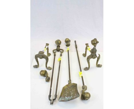 Brass Three Piece Companion Set with Pair of Matching Fire Dogs in the Rococo Style, each piece with Bird Claw and Ball Finia