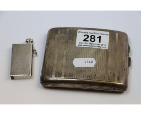 Silver lighter in the form of a book, London import marks to base, height approximately 5.5cm together with a silver cigarett