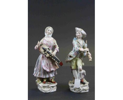 Pair of 19th Century ceramic figures with Musical intstruments with Meissen type blue crossed sword marks to bases, both with