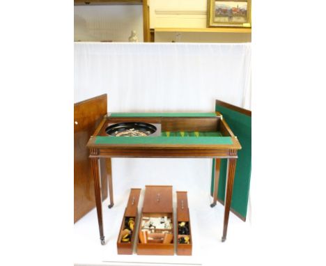 19th century Mahogany Games Table, the slide back top turning to reveal two inlaid chess boards, opening to reveal two inner 