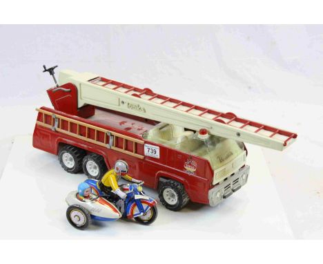 A vintage Tonka toy fire engine and a clockwork  motorbike combination.