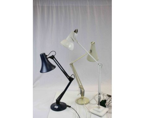Two Herbert Terry Cream Angle Poise Desk Lamps together with another Angle Poise Desk Lamp
