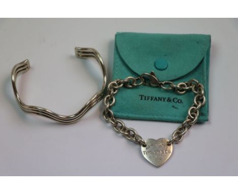 Tiffany silver bracelet, belcher link chain with heart shaped central panel, length approximately 19cm, in Tiffany pouch, tog