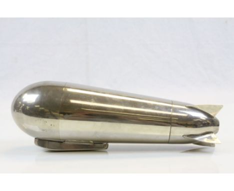 An Art Deco Electro Plated Cocktail Shaker In The Form Of A Zeppelin To A German Design By .J.A Henckels, The Detachable Tail