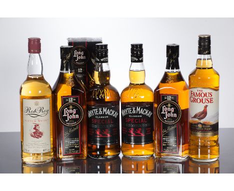 LONG JOHN 12 YEAR OLD
Blended Scotch Whisky. 75cl, 40% volume, in carton.
WHYTE & MACKAY SPECIAL DOUBLE LION BRAND
Blended Sc