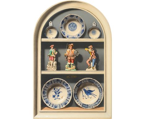 Christopher John Harrison RA (b.1945) Trompe l'oeil painting of a niche displaying Delftware plates and three figures includi