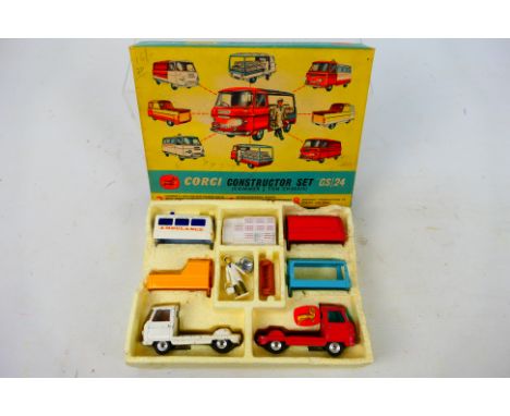 Corgi Toys - A boxed Corgi Toys GS 24 Constructor Gift Set. The set includes two Commer Chassis in red and white with 4 detac