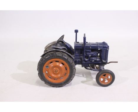 Chad Valley - An unboxed vintage Chad Valley Fordson Major tractor in 1:16 scale. The model is dusty and would benefit from c