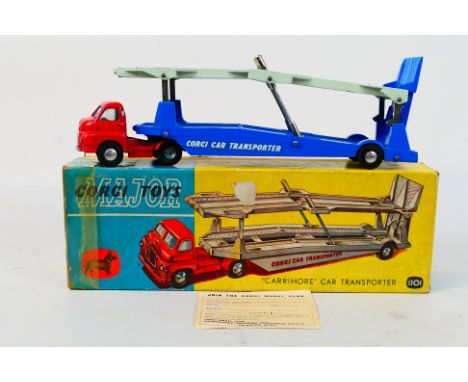 Corgi Toys - A boxed Corgi Toys #1101 'Carrimore Car Transporter'. The model with red cab, blue trailer with smooth hubs, app