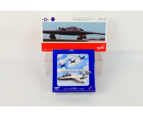 Herpa - Two boxed Herpa diecast military aircraft models. Lot consists of Herpa 571265 1:200 scale 571265 U.S. Air Force Nort