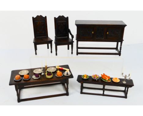 Tudor Time Miniatures by Norman Jones - 1:12 scale dining room suite comprising a 3 plank top dining table with tableware as 