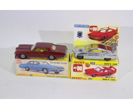  Dinky - 2 x boxed Dinky die-cast model vehicles presented within repro boxes - Lot includes a #173 Pontiac Parisienne in red