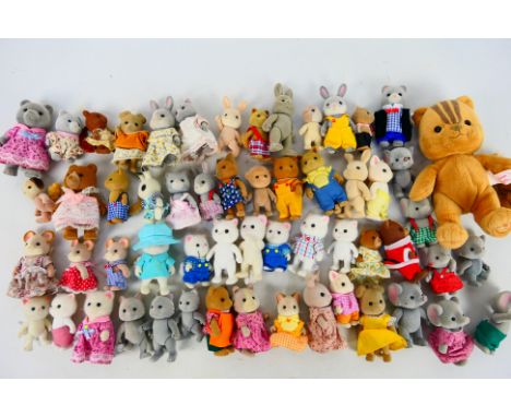 Sylvanian Families - A group of approximately 50 unboxed vintage Sylvanian Families animal figures. Lot includes Sylvanian Fa