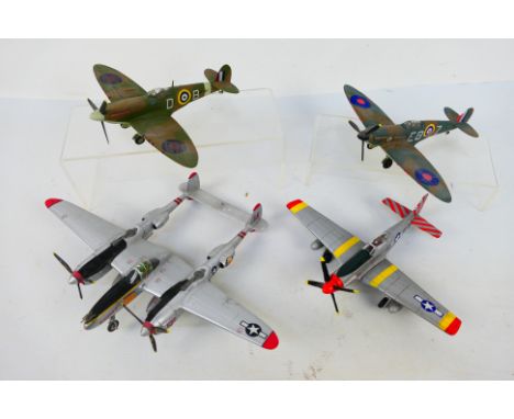 CDC Armour - Air Signature - 4 x unboxed models in 1:48 scale. An RAF Observer Corps Spitfire MkV, Spitfire Va, USAF P-51 Mus