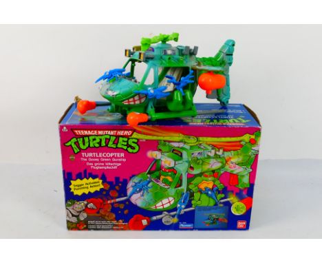 TMNT - Bandai - Playmates - Mirage. An original vintage Teenage Mutant Ninja Turtles ' Turtlecopter ' vehicle #5626. Opened o