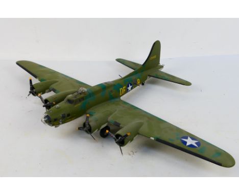 Franklin Mint Collection Armour - An unboxed USAF B17 Flying Fortress in 1:48 scale. The model named Memphis Belle is dusty f