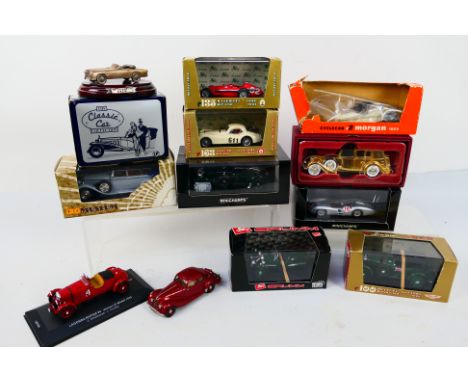 Minichamps - Ixo - Lansdowne - Corgi - A group of models in 1:43 scale, includes Mercedes Benz W196 Fangio car one of 3120 ma