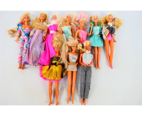 Mattel - Barbie - An unboxed collection of 10 Barbie dolls, in a variety of outfits.  Dolls have some signs of play generally