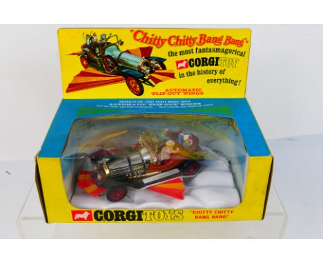 Corgi Toys - A boxed Corgi Toys #266 Chitty Chitty Bang Bang. The model with chrome, red, brown body with retractable red and