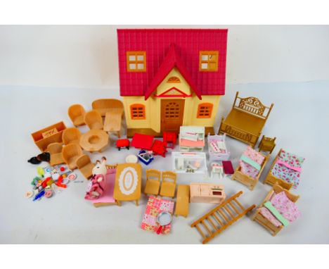 Sylvanian Families - A group of unboxed vintage Sylvanian Families toys and accessories. Lot includes Sylvanian Families Red 