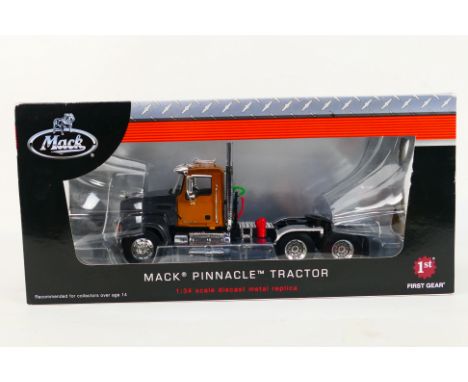 First Gear - A die-cast Mack Pinnacle Trailer in 1:34 scale - The model is presented in original box with cellophane windows.