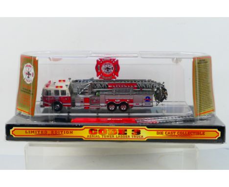 Code 3 Collectibles - A boxed limited edition 1:64 #12930 die-cast model fire engine - Model comes within its original plasti