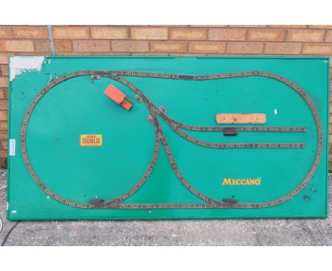 Hornby Dublo - A table top Hornby Dublo 3-rail layout in oval format. The table top measures approximately 185cms (L) x 94cms