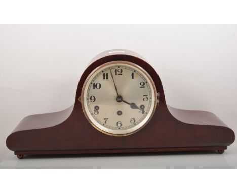 A rosewood Napoleon's hat mantel clock, movement striking on five gongs.

