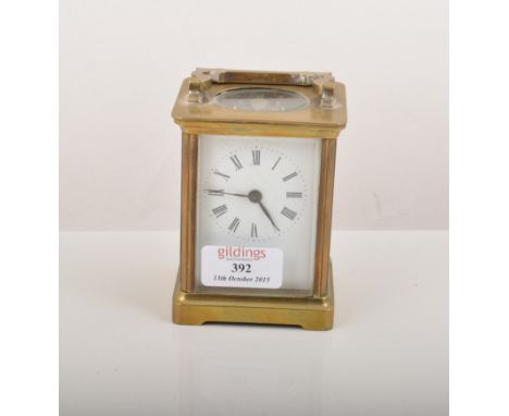 French brass cased carriage clock, white enamel dial, platform escapement, 12cm.