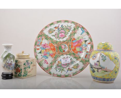 Cantonese porcelain plate, reserves painted in coloured enamels, diameter 26cm, a Chinese yellow ground ginger jar, a Japanes