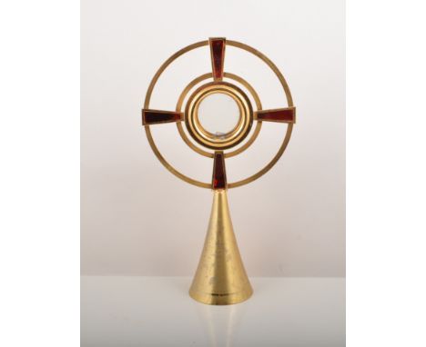 Plated Corpus Christi crucifix, 32cm, three other Corpus Christi crucifixes and a gilt metal and enamel monstrants, (5).