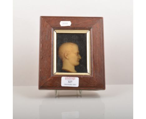 Wax profile portrait bust of Napoleon, in an oak frame, 17cm x 14cm overall.