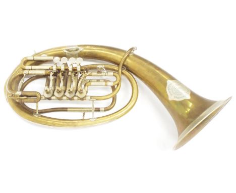 Baritone horn by the Brothers Schamal, Prague, inscribed Bratøi Schamalové..., brass tubing with nickel-silver mounts, oval f