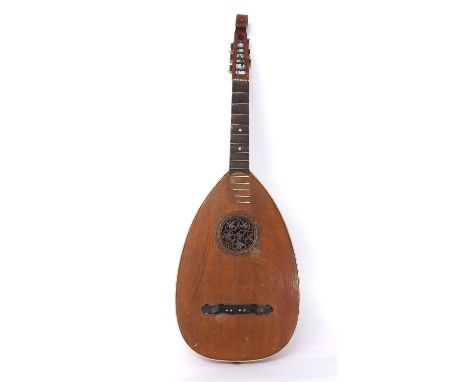 German six string lute guitar, with foliate pierced carved sound hole and head 