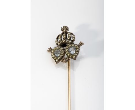 A "Two hearts surmounted by Brazilian imperial crown" scarf pin, gold and silver, set with 2 aquamarines and 1/2 pearls, card