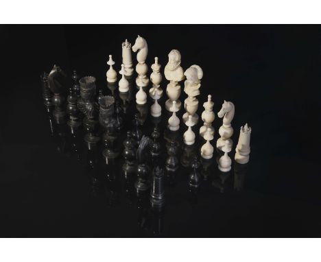 Chess Pieces - Army of Henry IV against an African Army, one of the sets in ivory probably from Dieppe, the other in ebony, F