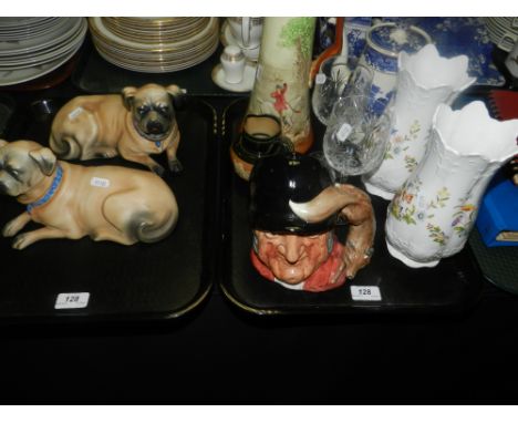 A pair of continental slip cast pugs, a Royal Doulton fox hunting design jug (at fault), a Royal Douton Toby jug 'Gone Away',