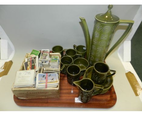 A Portmeirion 'Totem' pattern part coffee service, to include coffee pot, milk jug, cups and saucers, along with various ciga