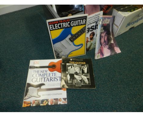 Magazines and booklets on playing the guitar