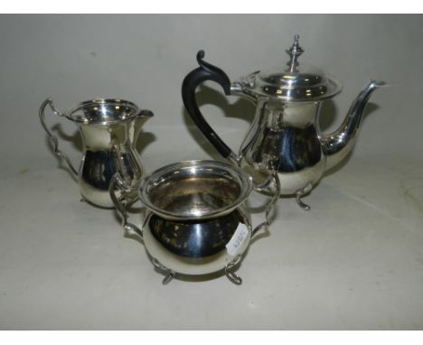 A three piece silver plated tea service, comprising tea pot, milk jug and sugar bowl