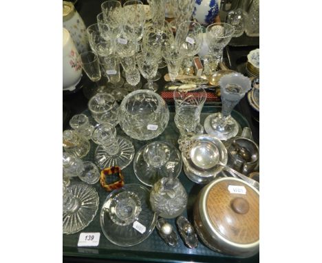A quantity of glass wares, to include a decanter and stopper, short candlesticks, various glasses, etc. along with two biscui