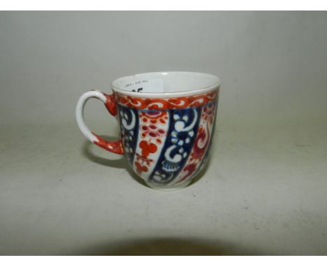 A First Period Worcester porcelain coffee cup, decorated in the Queen Charlotte pattern (handle repaired)*