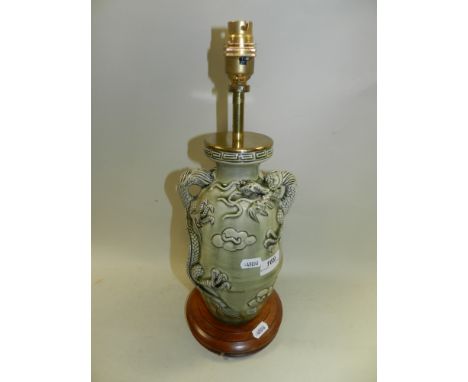 A modern Chinese style lamp base, decorated with sinuous four clawed scaly dragons