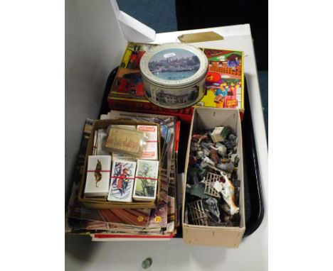 A quantity of glass marbles, part of a Trix Unit system, copies of the Meccano Magazine circa 1950's-60's, football programs,