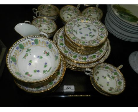 An English porcelain part tea service decorated in the French style, retailed by T. Goode