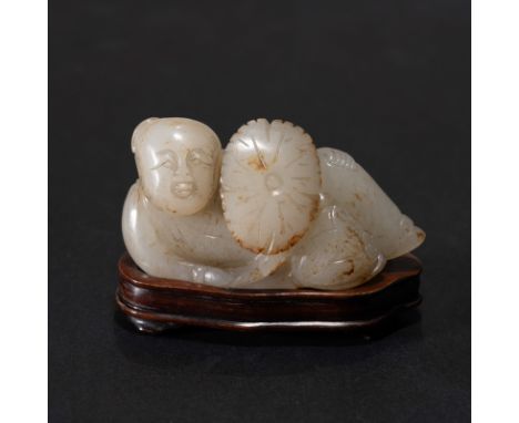A CHINESE WHITE JADE 'BOY AND LOTUS' ORNAMENT； H3.5cm，L6.4cm；Jade 79g，Stand 71g；with stand;