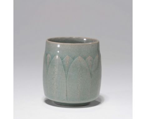 A KOREAN CELADON 'LOTUS' TEA CUP, GORYEO DYNASTY； H 7.4cm，W 6.9cm，Caliber 6cm，Foot diameter 4.2cm; 158g; with injured part on